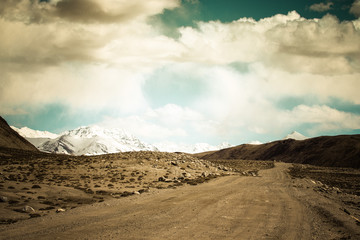 Fototapeta na wymiar Tajikistan. Pamir highway. Road to the clouds. Toned
