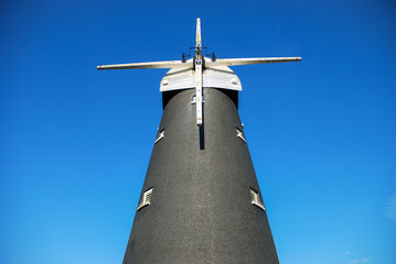 Traditional black brick windmill