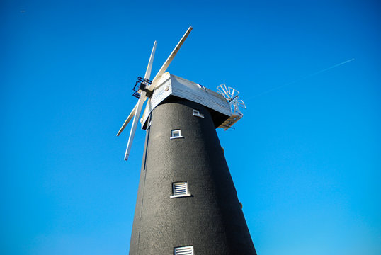 Traditional black brick windmill