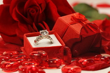 Red hearts and rose with wedding ring