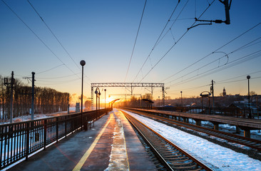 Fototapeta na wymiar view of railway station before sunset