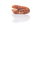 Pecan nut over white background