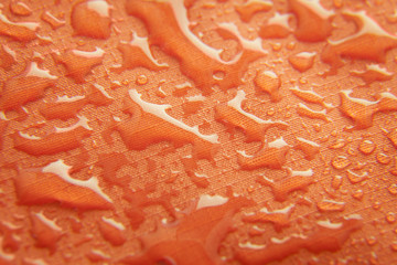 Orange waterproof membrane textile background