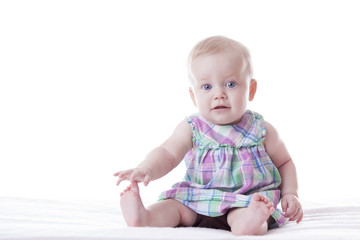 Little cute baby-girl in dress,
