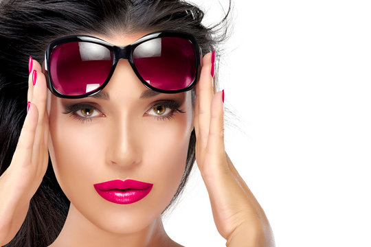 Beautiful Model Holding Fashion Sunglasses on Forehead