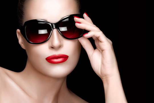 Fashion Model Woman in Black Oversized Sunglasses. Colorful Make