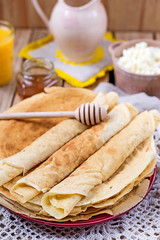 Homemade cottage cheese with orange juice and pancakes