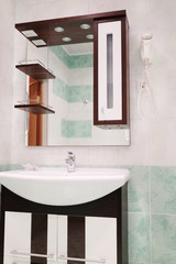 washroom with mirror