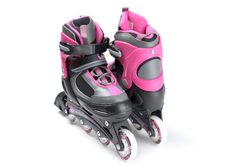 Pink roller skates isolated on white background