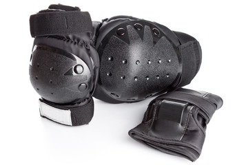 skating protection equipment, knee and wrist protectors, on a wh