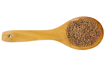 Lentils with wooden spoon isolated on white background.