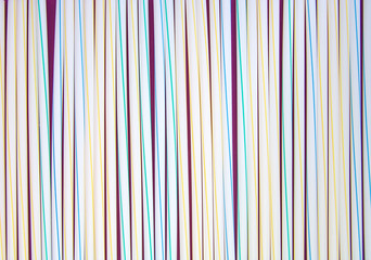 Obraz premium Set of white and colored drinking straws. Background.