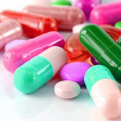Colorful of oral medications on White Background.