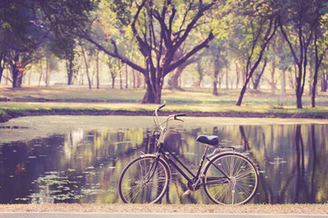 Fototapeta na wymiar Vintage bicycle in Sukhothai Historical Park, Thailand