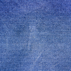 Naklejka premium Blue denim jeans texture or background