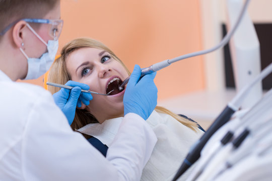 Dentist Drilling A Tooth