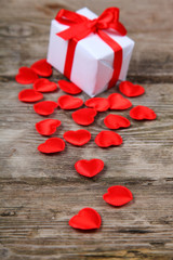 Holidays gift and red hearts