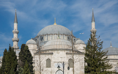 Fototapeta na wymiar Suleymaniye Mosque and plane in the sky of Istanbul