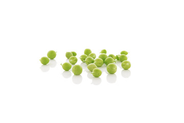 green pea seeds on white background