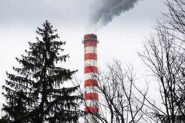 Industrial chimneys blowing dirty smoke