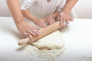 Obraz na płótnie Canvas Teamwork Kneading Dough