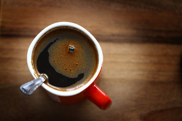 A cup of black coffee. Kubek czarnej kawy.