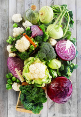 Assorted Fresh Vegetables on Wooden Table - obrazy, fototapety, plakaty