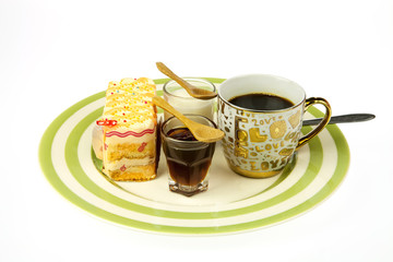 cup of coffee and delicious orange cake