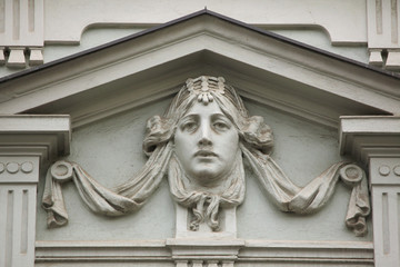 Fototapeta na wymiar Mascaron on the Art Nouveau building in Prague.