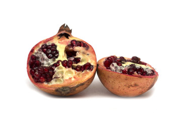 Cut half of the fruit - pomegranates. Photo.