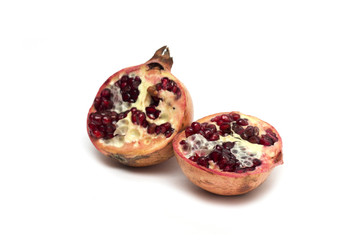 Cut half of the fruit - pomegranates. Photo.