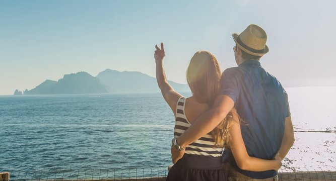 Beautiful Young Romantic Couple On Vacation Hugging Cissing