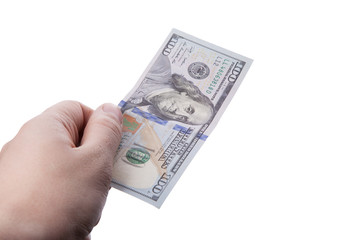 male hand holding one hundred dollar banknote on white backgroun