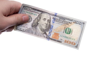 male hand holding one hundred dollar banknote on white backgroun