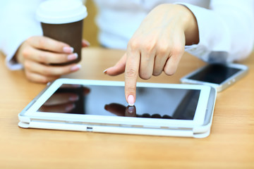Digital tablet with blank screen in coffee shop cafe