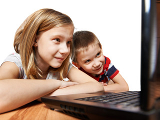 Children looking to laptop