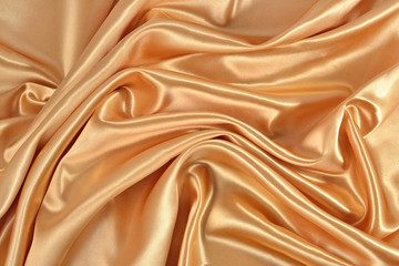 Fototapeta premium Background from golden satin fabric