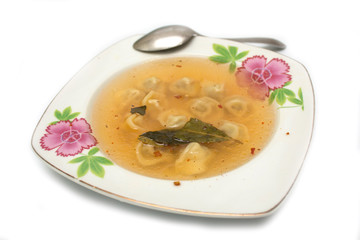 Soup dumplings on a plate. Photo.