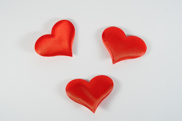 red hearts on white background