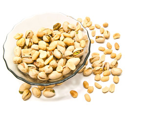 plate with pistachios and peanuts