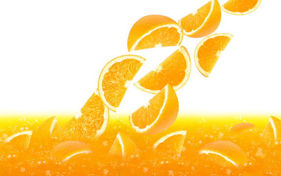 fresh orange slices falling in juice