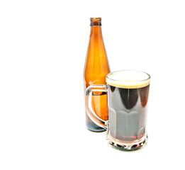 mug of dark beer and bottle