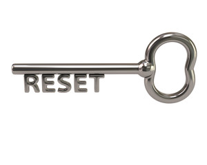 Silver key with word reset