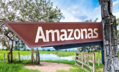 Amazonas wooden sign with rural background