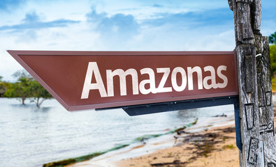 Amazonas wooden sign with a lake background