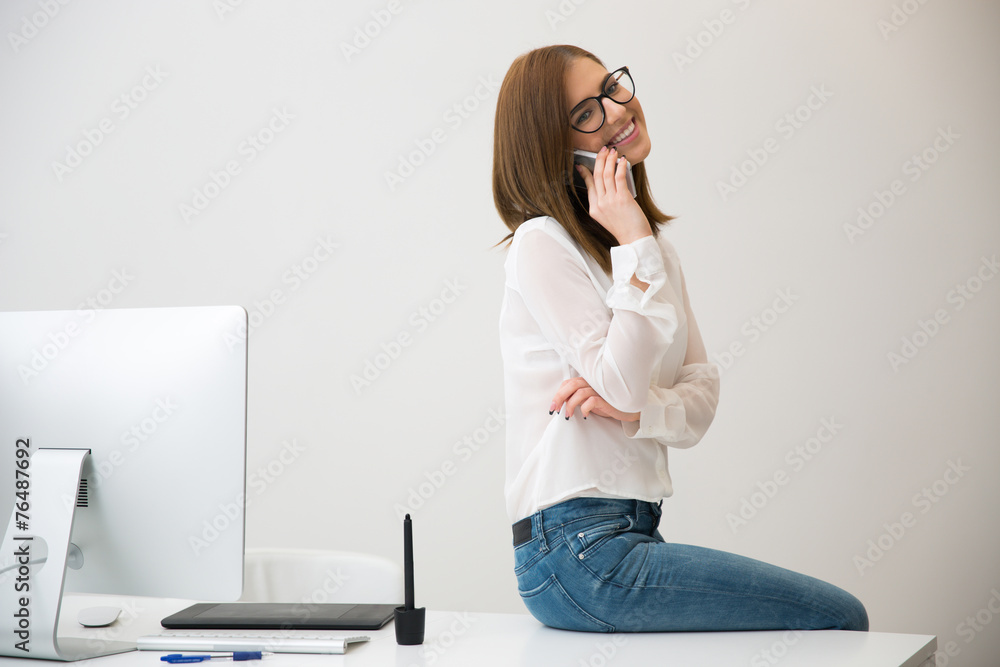 Canvas Prints Portrait of a happy businesswoman in office