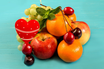 Juicy fruit on a blue wooden background