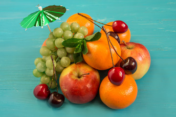 Juicy fruit on a blue wooden background
