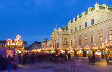 Fototapeta premium Vienna - Belvedere palace at the christmas market in dusk