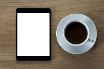 Obraz na płótnie Canvas Tablet computer and cup of coffee